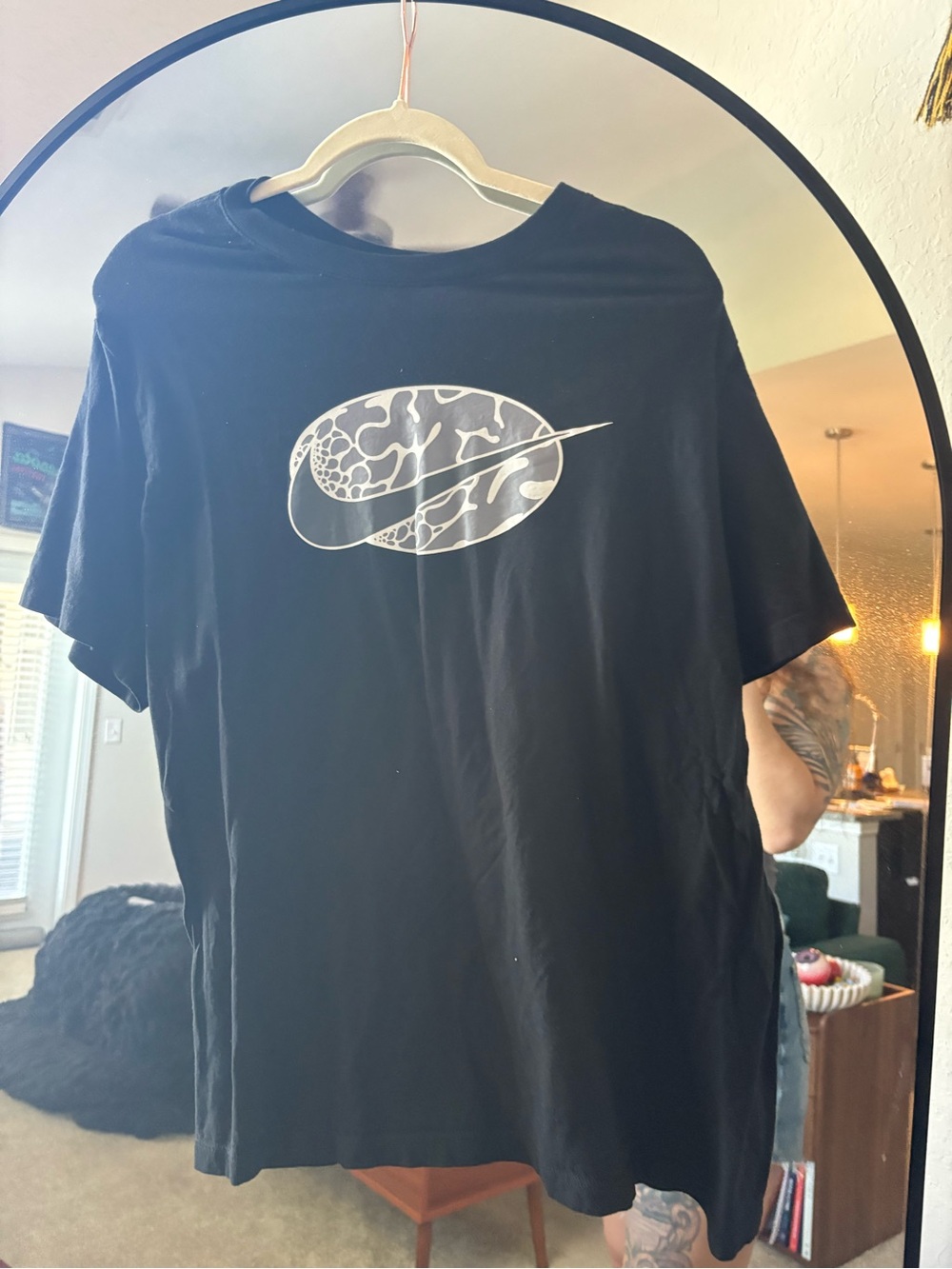 Nike Black Short-Sleeve Tee with White Swoosh Graphic